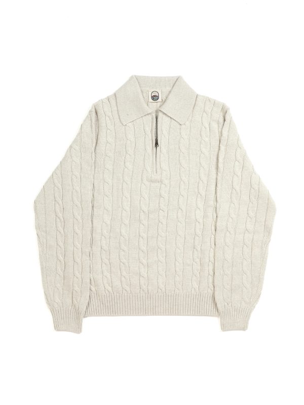Front view of the NR NAPOLI GIAN greige Cashwool polo with cable knitting, a generous collar, a zip neckline, long sleeves and ribbed trims.