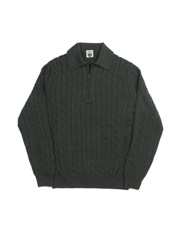 Front view of the NR NAPOLI GIAN green Cashwool polo with cable knitting, a generous collar, a zip neckline, long sleeves and ribbed trims.