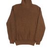 Front view of the NR NAPOLI JEAN brown rollneck sweater with English rib knitting, long sleeves and ribbed cuffs and hem.