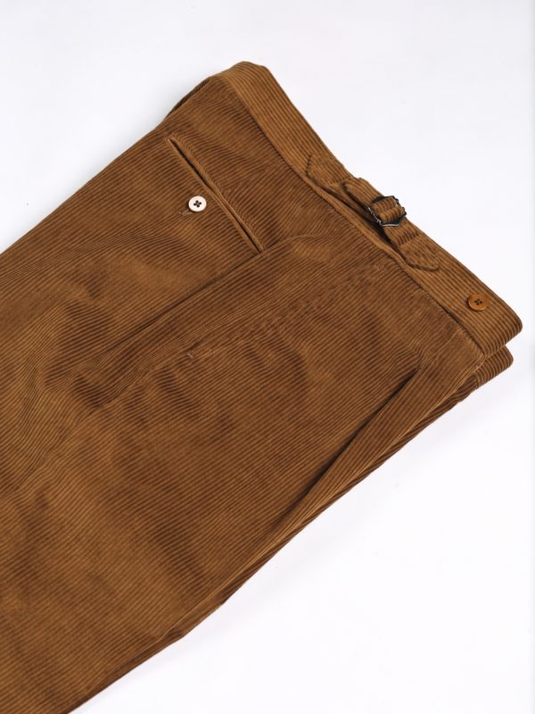 NR Napoli NRP Mod. 1 tobacco corduroy trousers, folded to show the side adjuster and buttoned back pocket.
