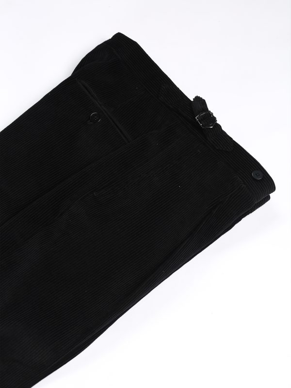 NR Napoli NRP Mod. 1 black corduroy trousers, folded to show the side adjuster and buttoned back pocket.