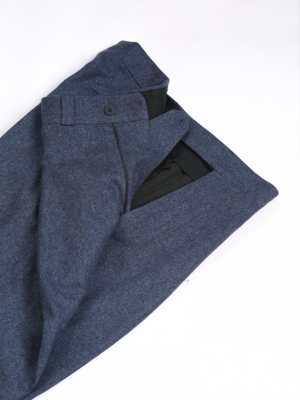 NR Napoli NRP Mod. 1 indigo flannel trousers, folded to show the side adjuster and buttoned back pocket.