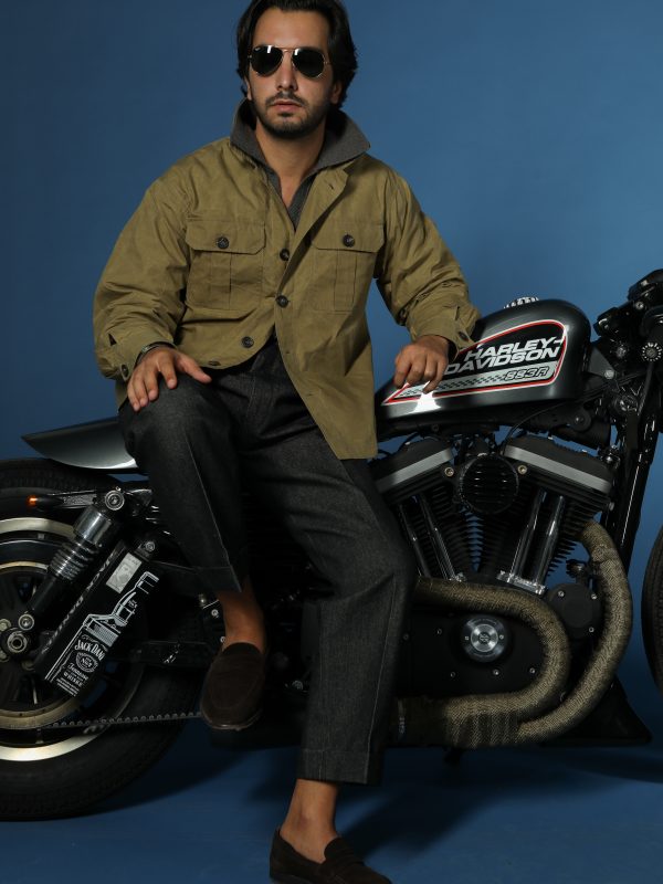 Model wearing the NR Napoli TARGA Jacket in beige waxed cotton.