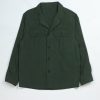 TARGA Jacket in olive waxed cotton by NR Napoli, front view with four-button closure and utility chest pockets.