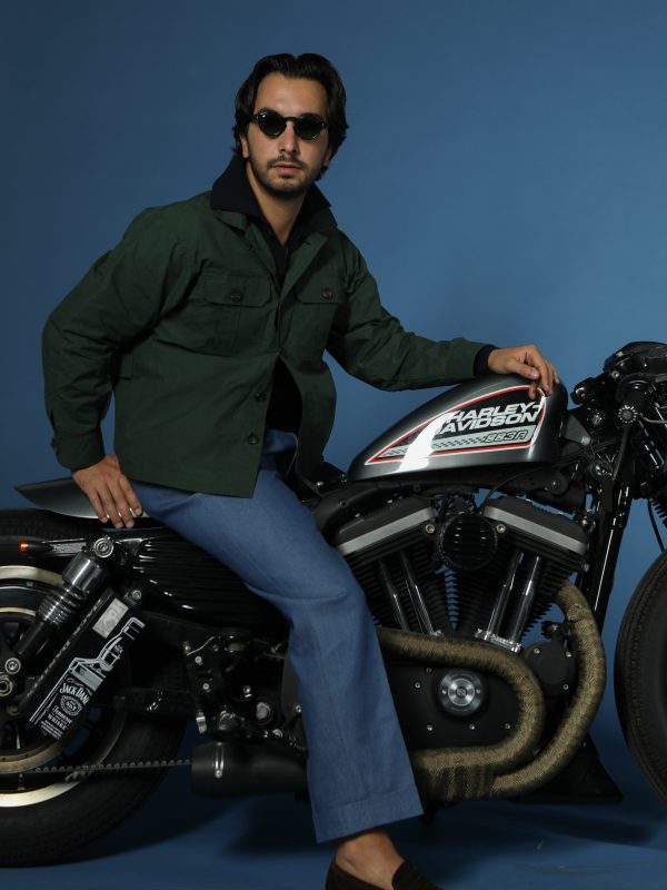 Model wearing the NR Napoli TARGA Jacket in olive waxed cotton.