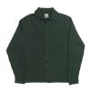 NR NAPOLI SANITÀ green Cashwool cardigan with an interlocking diamond pattern, polo collar and button front, shown on a white background.
